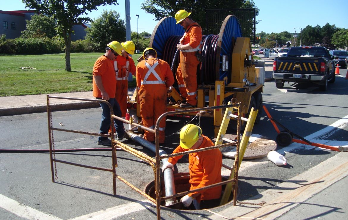 Screenshot of public works employees addressing sewer issues.